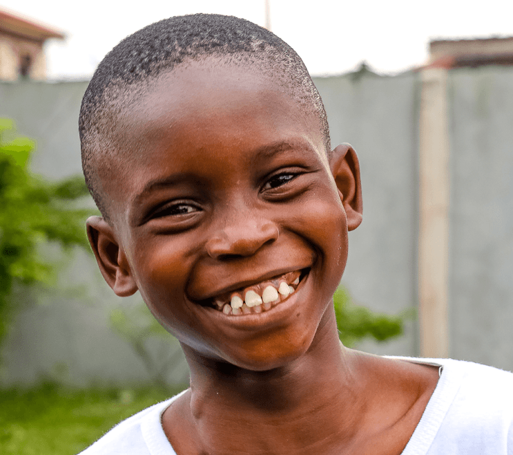 young boy with smile at the breach learning center 